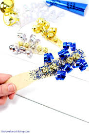 Easy New Year S Eve Diy Noise Maker Craft For Kids Natural Beach Living Kids New Years Eve New Year S Eve Crafts New Year S Crafts