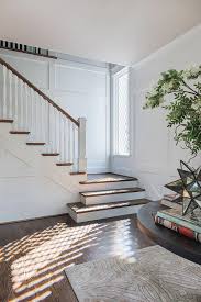 Foyer Wainscotting Oyer Features Floor To Ceiling Millwork On The First Floor Of The Foyer This Continues Up The Staircase An Staircase Design Stairs Staircase