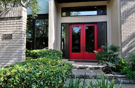 A red front door can serve to complement or contrast with the rest of your home's exterior, as well as provide accent to its particular style. Creating A Charming Entryway With Red Front Doors