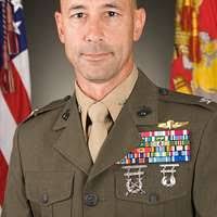 Col. Paul Sellars, incoming commander address the formation