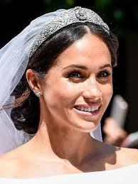 She ditched her signature chignon and wavy tendrils for a series of coils pinned along the back of her head. Wedding Hairstyle Ideas For The Christian Bride