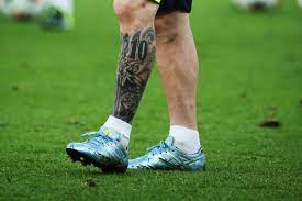 Lionel messi has a tattoo which stands out on the bottom of his left leg. Lionel Messi Tattoo Barcelona Star S New Leg Ink Sports Illustrated