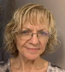 Damp curly hair with Curly Trio scrunched in