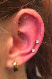 Two Fresh Low Cartilage Piercings With 4mm Cz S 920tattoo 920tattoocompany Piercingsbymollymo Cartilage Piercing Piercings For Girls Ear Piercings Cartilage