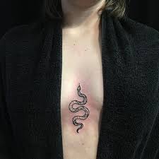 Small Snake Tattoo On The Chest Small Snake Tattoo On The Chest Chest Diytattootemporary Fingertattoo Serpe In 2020 Small Snake Tattoo Tattoos Trendy Tattoos