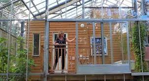 This sweedish home is built inside a greenhouse providing free heat from the sun and great views of the lake and wilderness around it. Swedish Couple Built Their Home Inside A Greenhouse And Now Their Life Is A Total Dream Greenhouse House In Nature Build Greenhouse