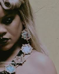 Glass lips and sculpted cheeks. @BadGalRiri wearing #GlossBomb and  #Matchstix