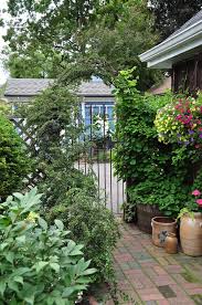 Check out the lawn and garden section from lifetime. Three Dogs In A Garden Small Space Gardens Plus Book Reviews And Giveaway Small Space Gardening Small Garden Shed Small Water Gardens