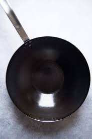 The seasoning process is relatively simple, although it is slightly when the wok is hot, add a teaspoon or two of oil. How To Season A Wok Step By Step Guide Healthy Nibbles