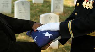 Image Of A Folder American Flag Being Handed Over To A Family Member At A Va National Cemetery Veteran Veterans Benefits Burial