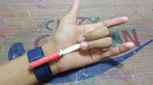 A4 paper rubber band hot glue gun. How To Make A Spider Web Shooter Youtube