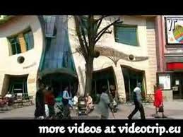 Although it's architecture is similar to that of the surrounding buildings, this crooked house seems weary or melting. Crooked House Part 2 Sopot Poland Youtube