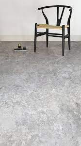 Vinyl plank flooring with a robust backing has some insulation value but not much, so if you want the cold concrete to feel comfortable, you may have to install a although vinyl flooring is flexible, it will separate if you install it over an uneven surface, so if the concrete has high spots, you need to grind. Concrete Effect Vinyl Flooring Vinyl Flooring Floor Design Beautiful Houses Interior