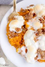 Crispy sweet pecan topping with creamy sweet potatoes underneath, even a person who doesn't like veggies will be diving into this dish. Sweet Potato Casserole With Marshmallows And Streusel Celebrating Sweets
