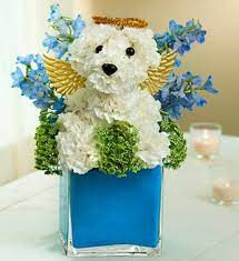 Whether you're looking to buy flowers and gifts like roses , orchids, gift baskets, bonsai trees, flowering plants or wedding bouquets, we have the highest quality blooms and the. Pin By Amparo Salazar On That S Too Cute Animal Flower Arrangements Flower Arrangements Dog Flower