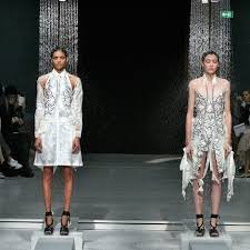 The designer hussein chalayan created a possessed dress for a new show about technology and fashion opening this weekend. Hussein Chalayan Dissolving Clothing Pfw Fashion Show