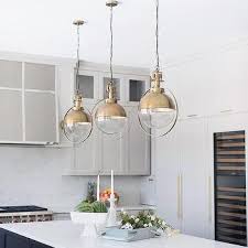 three vintage glass kitchen pendants