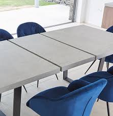 Table made of veneers, wood and engineered wood. Levante Concrete Effect 180cm Extending Dining Table 6 Elson Blue Velvet Chairs