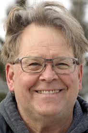 Duluth man publishes 3-volume tale of his bike trip around the world