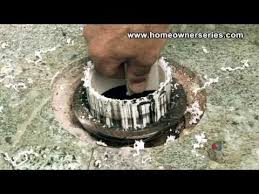 Slip your repair flange spanner under the toilet flange but replace a toilet bolt in the concrete floor through the hole in your spanner for easy toilet reinstallation. How To Fix A Toilet Cement Sub Flooring Repairs Part 2 Of 2 Youtube