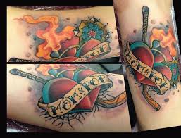There were seats for all the customers and the walls were covered with a giant library of tattoos for. Tattoos Tattoo Factory