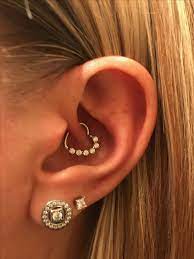 My New 16 Gauge Clear Cz Heart Left Closing Daith Cartilage Tragus Earring From Bodycandy Daith Piercing Jewelry Ear Jewelry Ear Piercings