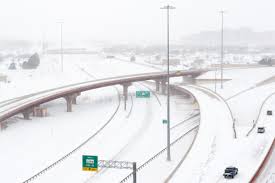 White powder falling from the sky during winter. Texas Snow Pictures And Videos Show State Hit By Unprecedented Winter Storm