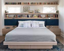 Letto contenitore con vani libreria in legno ; Design Per Bibliofili Libreria E Testata Letto Insieme Dilei