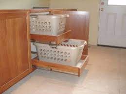Pull out hampers with canvas bags. Pull Out Laundry Basket Design Ideas Pictures Remodel And Decor Laundry Room Laundry Hamper Closet Door Makeover