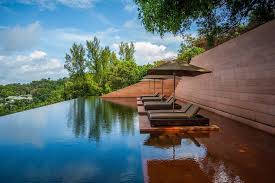 Amazing Resort Pool With Lounge Chairs Above Water Swimming Pool Designs Pool Lounge Resort Pools