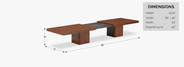 A lower shelf offers space for keepsakes, and when you lift the top of this hardwood coffee table, it reveals an additional storage area for board games, work documents, or electronics. John Keal Expanding Coffee Table For Brown Saltman Danish Modern L A