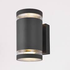 They illuminate dark corners, brighten doorways and make the general appearance of a and an outdoor wall light on the back patio helps keep the space lit for those late nights engaging in conversation outside. Finley Up Down Outdoor Wall Light Anthracite Lampsy