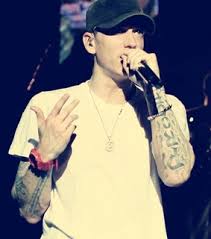 From aberdeen, scotland, nikki has now achieved the record title for the most tattoos of the same musician tattooed on the body by getting 15 portraits of the american rapper, eminem, inked on her body. Proof Tattoo Images On Favim Com