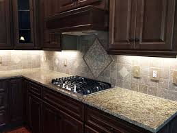Travertine Backsplash And Medallion With Granite Countertops Trendy Kitchen Backsplash Dark Kitchen Cabinets Backsplash With Dark Cabinets