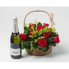 Flowers & wine for her: Salvador Traditional Basket With 9 Red Roses And Spark Flower Delivery 9 Red Roses And Wine Flower Delivery Salvador Online Florist Salvador
