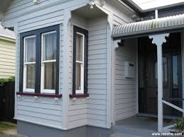 a grey baseds exterior colour scheme in keeping with the age