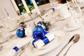 Or create a single uniform color theme with one bright hue like blue, green or red. Elegant Blue And White Christmas Table Setting Stock Photo Picture And Royalty Free Image Image 5876252