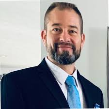 Tim "Hank" Herrick, M.HrD