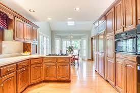 Cream colored cabinets with oak trim. The Perfect Shade Of White Wall Paint For Oak Trim Laurel Home