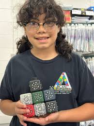 Second graders learn coding with new robots and tablet