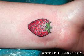 The fruit looks so delicious and attractive, no wonder it caught the attention of tat enthusiasts to consider them as ink designs on their body. 19 Strawberry Tattoo Images Pictures And Design Ideas