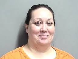 Clive woman allegedly tries to shoot husband in bed