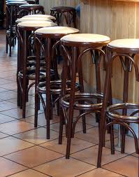 It features a rectangular, plank top that's spacious enough for casual dining. Bar Stool Wikipedia