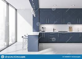 loft dark blue kitchen with bar and