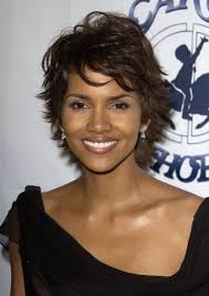Halle Berry's hair evolution: From pixie to purple curls