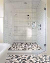 Beige herringbone tile is a clever way to make a tiled bathroom and shower floor look like a wooden floor. 10 Best Shower Floor Tiles In 2021 The Ultimate Guide