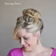Elegant Curls, Fancy Bun, & Glam Ponytail (on RealSimple.com)