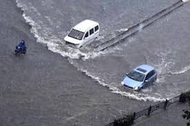 Cars sit in floodwaters after heavy rains hit the city of zhengzhou in china's central henan province, july 21, 2021. Z 2g7uayiimqim