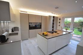 Having vaulted ceilings in the kitchen will allow us to add extra or bigger windows, thus letting in more light. The Tall Bank Of Recessed Kitchen Units Create A Real Wow Factor Adding To The Minimalistic Uncluttere Kitchen Room Design Kitchen Units Tall Kitchen Cabinets