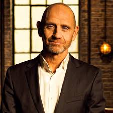 Who is Dragons' Den presenter Evan Davis?